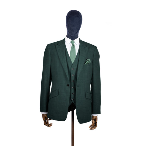 Sage Green knitted tie and pocket square with green suit on a mannequin-BroniandBo