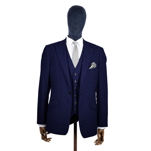 Silver Knitted tie and pocket square with navy suit on a mannequin - centre