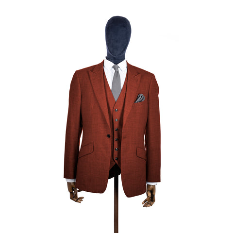 Stone Grey knitted tie and pocket square with rust suit on a mannequin-BroniandBo