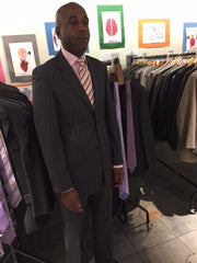 Suited and booted pin stripe suite