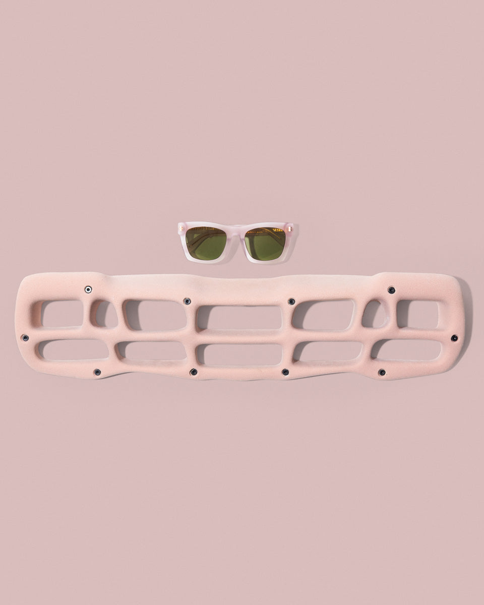 Jason Momoa On The Roam x Electric Sunglasses shown with so ill Rise hangboard