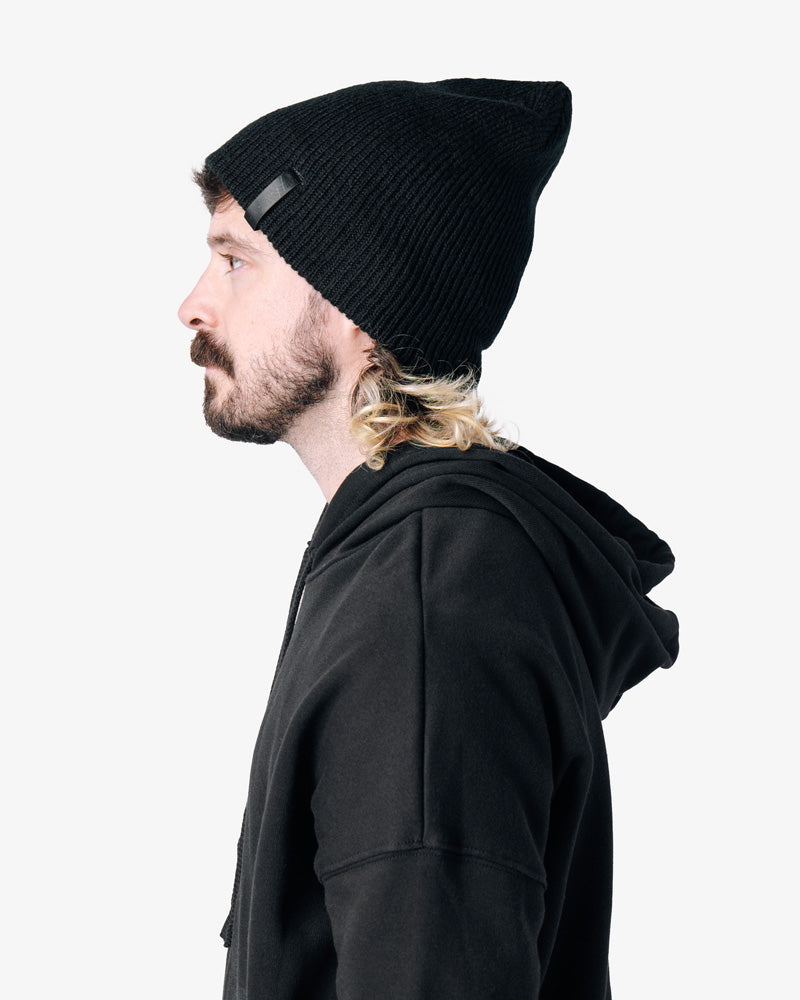 so ill x on the roam black beanie being worn by a man and viewed from the side