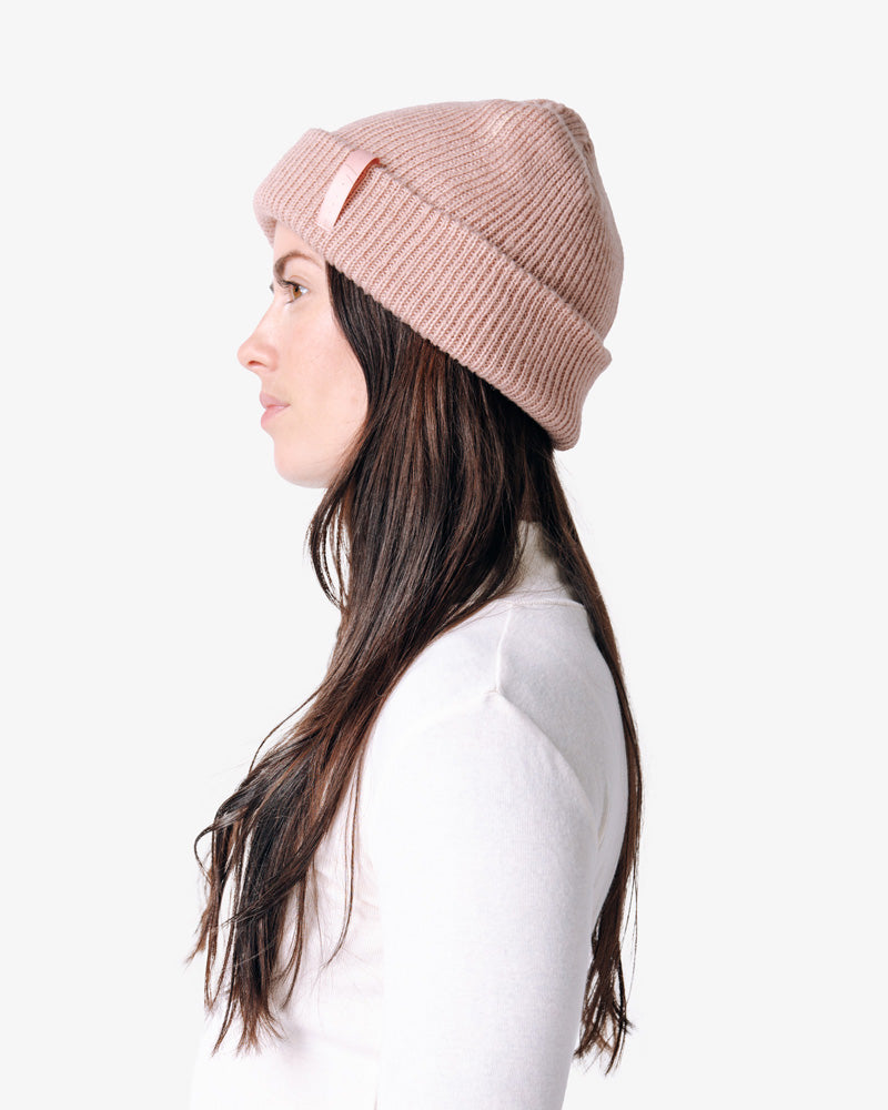 so ill x on the roam black beanie being worn by a woman and viewed from the side