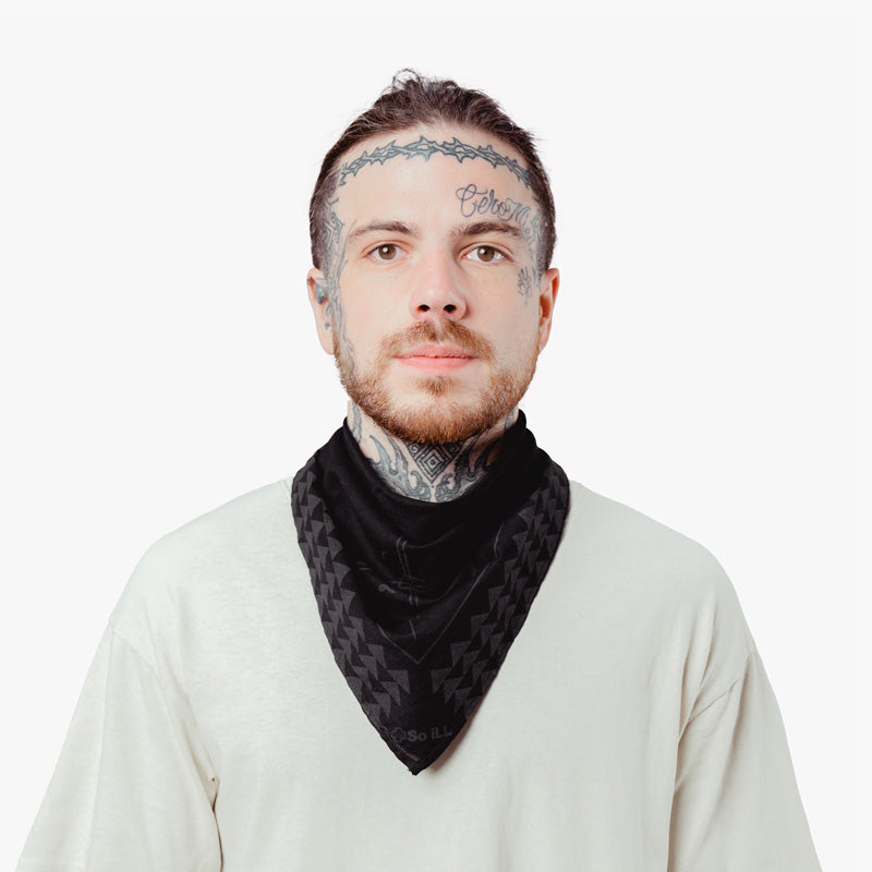 a man uses the so ill x on the roam bandana as neckerchief