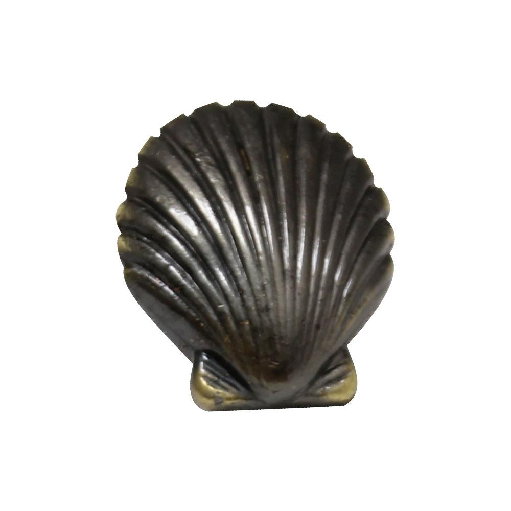 Solid brass seashell-shaped knob.