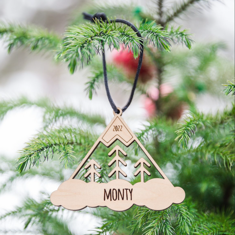 mountain and tree ornament in maple wood with 2022 and name Monty by LeeMo Designs in Bend, Oregon