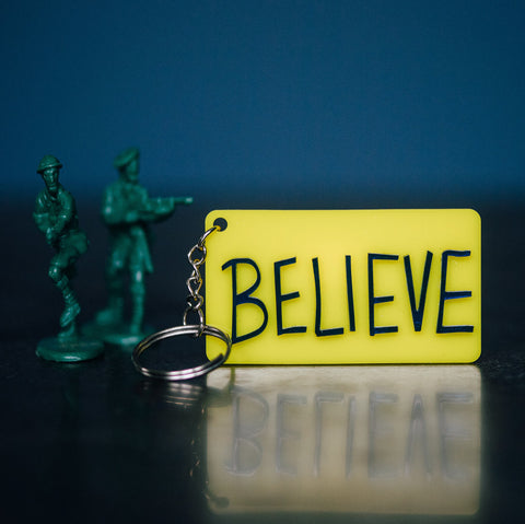 Ted Lasso Believe Sign Keychain in Yellow & Blue Acrylic by LeeMo Designs in Bend Oregon