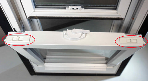 Location of tilt latches on window sash