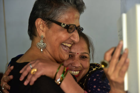 Parwa Devi weaver at Dev Bhumi gives Beena tai a hug
