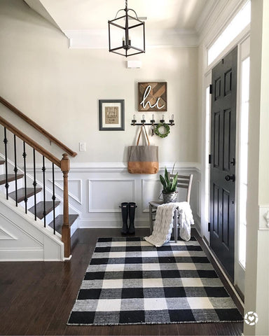 Staircase with checkered rug