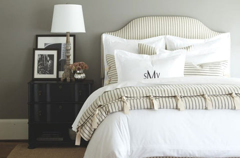 White-striped duvet on bed