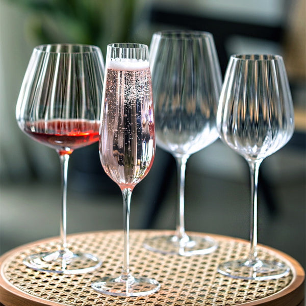 Discover Elegance: Tulipan Petal Wine Glasses in Stunning Pink and Green