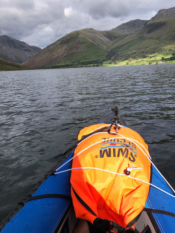 Wild Swim Bag in use while SUP