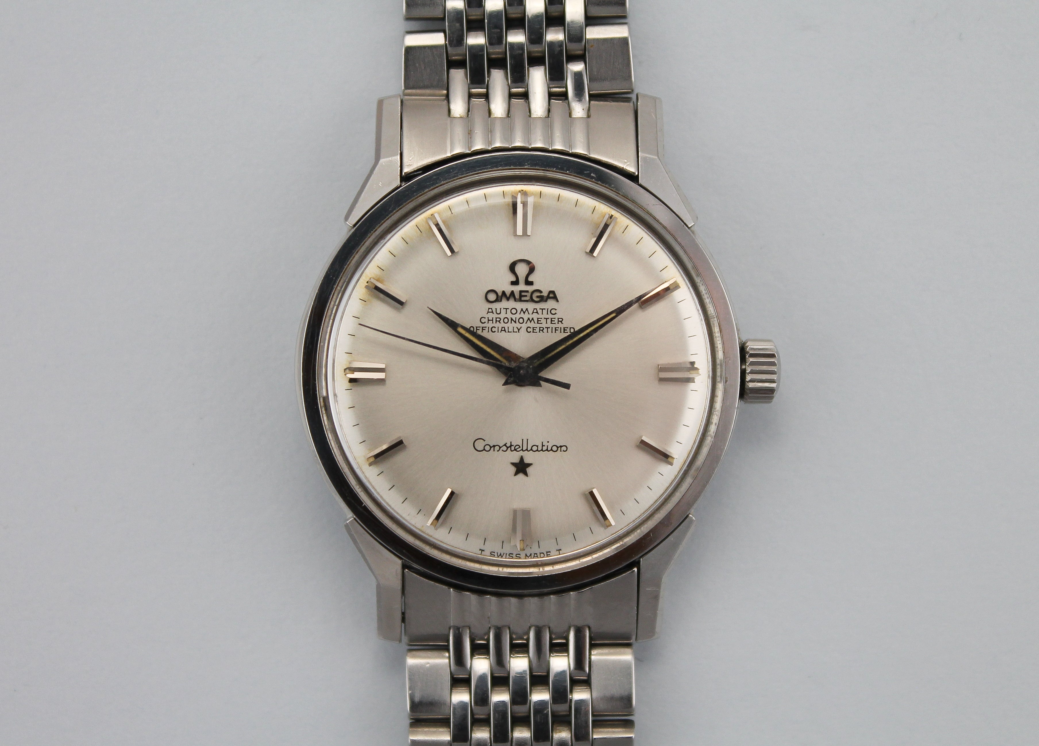 167.005 omega