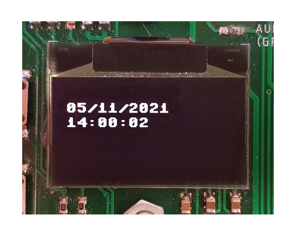 Pico Smart Air Quality Board OLED & RTC Tutorial - Close up of OLED screen displaying date and time left justified