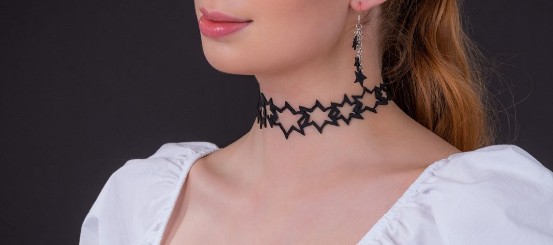 gifts for star lovers - woman wearing star choker and earrings