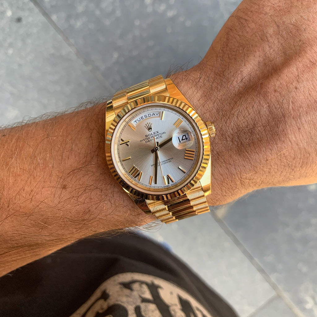 rolex day date 40 yellow gold white dial