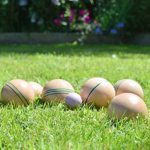 Party Pieces wooden boules set on a green grass lawn