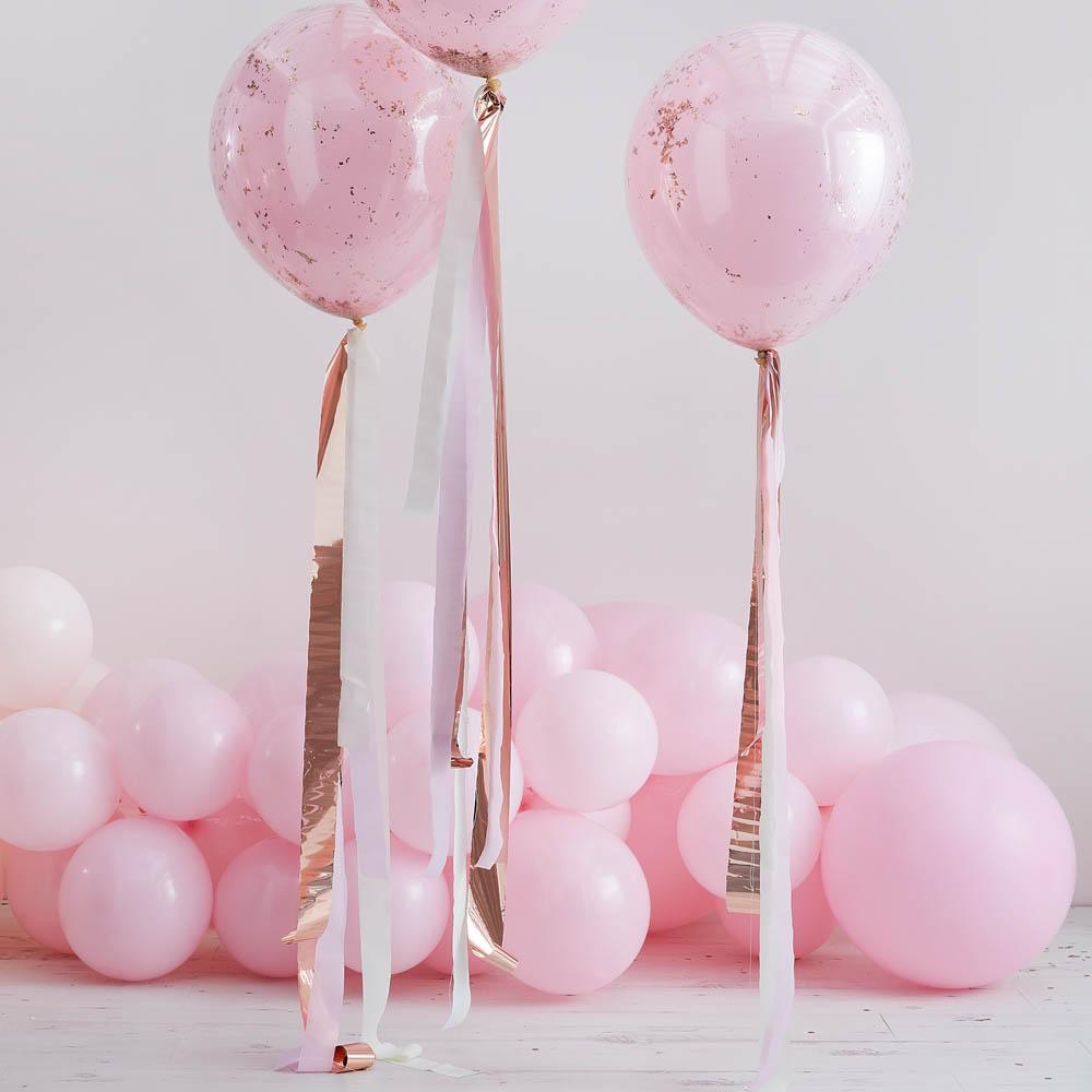 Run two pieces of string across the ceiling and hang streamers