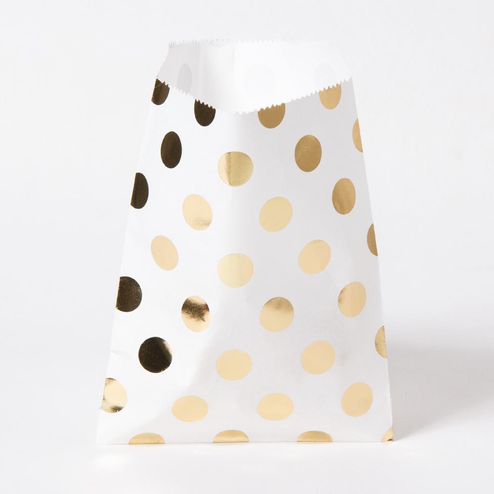 Click to view product details and reviews for Metallic Gold Polka Paper Party Bags X8.