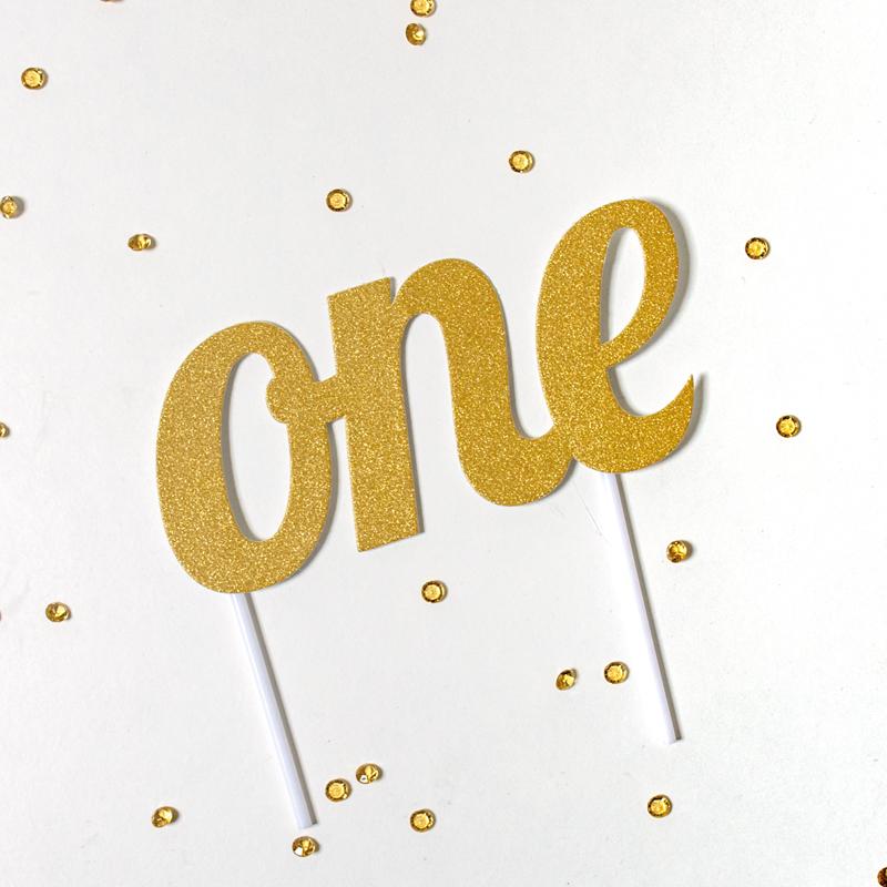 Click to view product details and reviews for Glitter One Cake Topper Gold.