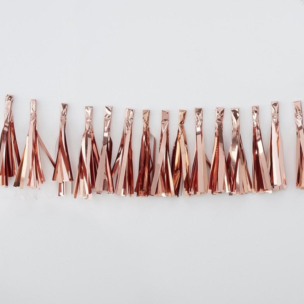 Click to view product details and reviews for Tassel Garland Metallic Rose Gold.