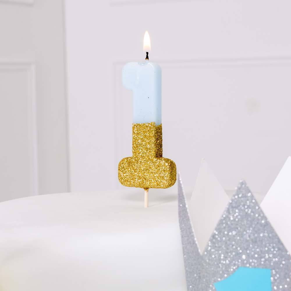 Click to view product details and reviews for Gold Glitter Dipped Candle Blue Age One.