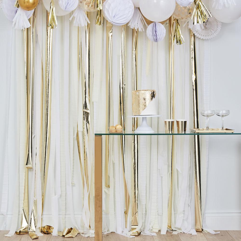 Click to view product details and reviews for Mix It Up Gold Metallic Streamer Backdrop.