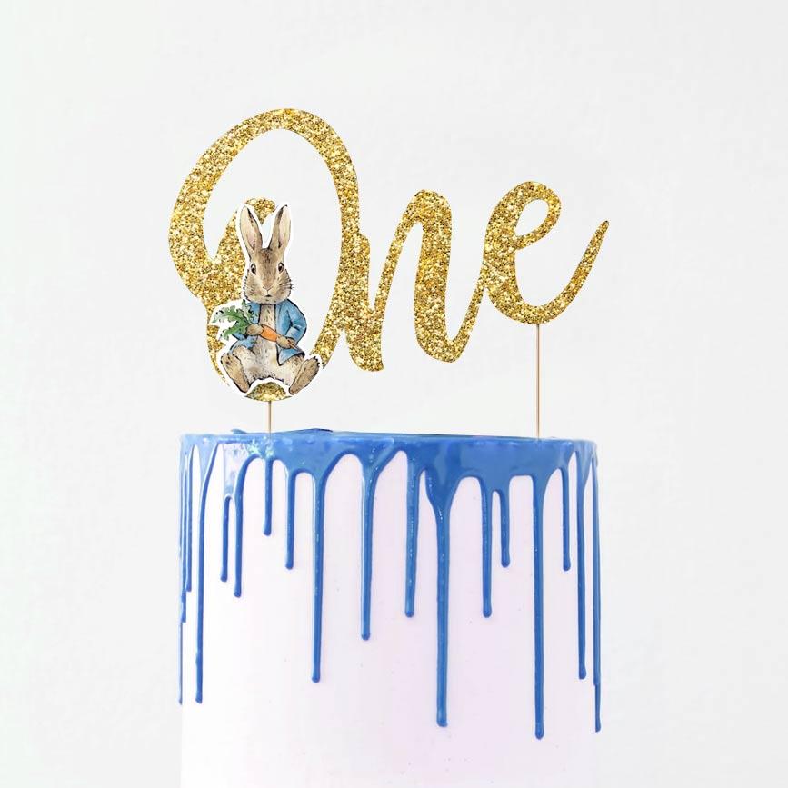 Click to view product details and reviews for Peter Rabbit One Glitter Cake Topper Each.