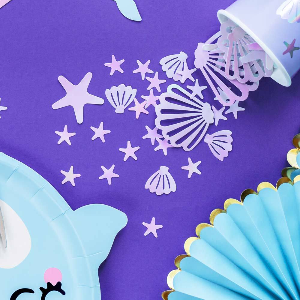 Click to view product details and reviews for Iridescent Sea Shaped Confetti.