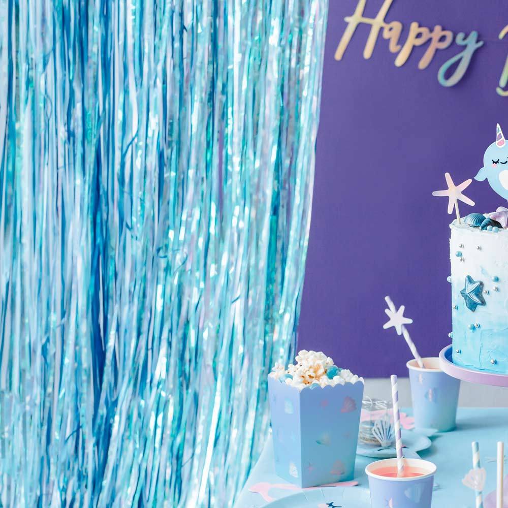 Click to view product details and reviews for Fringe Backdrop Shimmery Blue.