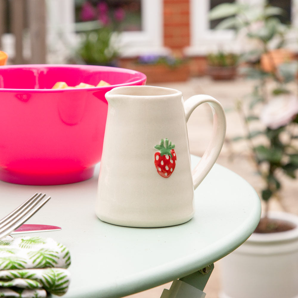 Click to view product details and reviews for Ceramic Mini Jug With Strawberry Design.