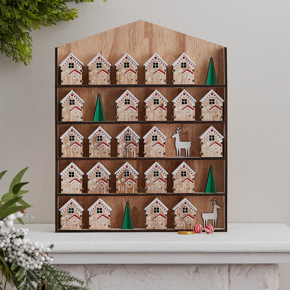 Click to view product details and reviews for Wooden Tree With Mini Houses Advent Calendar.
