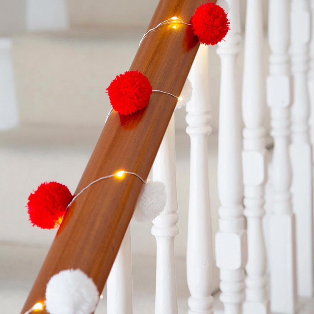 Click to view product details and reviews for Red And White Pom Pom Lights.