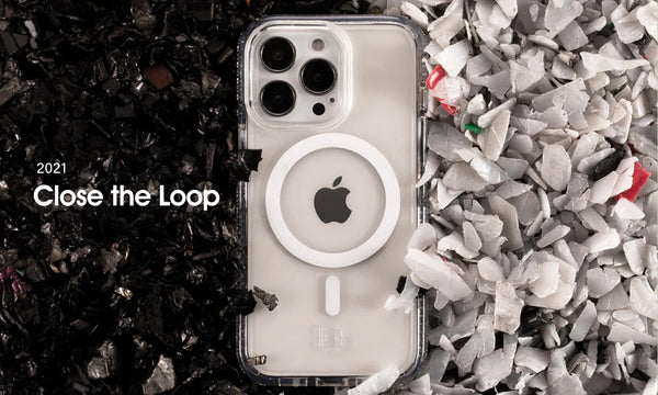 Close the loop image of a phone case surrounded by recycled material pellets