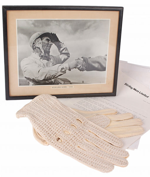 Stirling Moss wearing his crochet back drving gloves in 1956