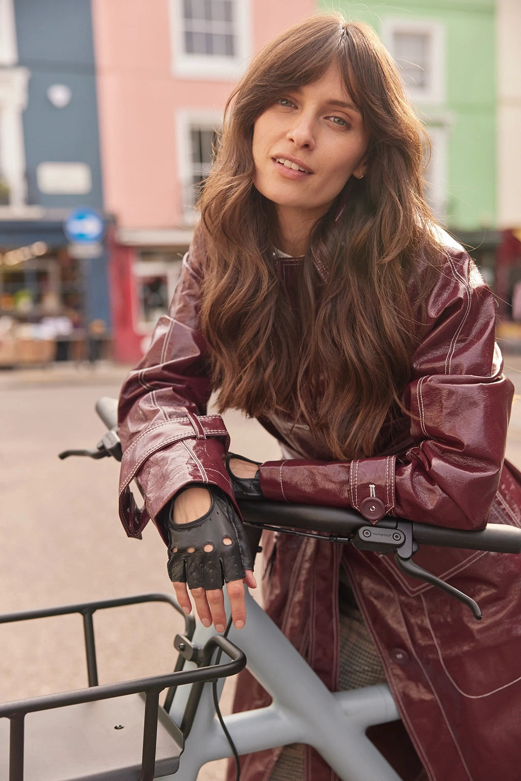 woman wearing gloves on bike