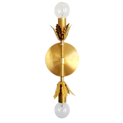 Brass wall sconce with leaf-like accents. Small beautiful wall sconce