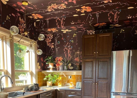 Braa Chimie Chandelier by Sazerac Stitches in dark moody kitchen with floral wallpaper