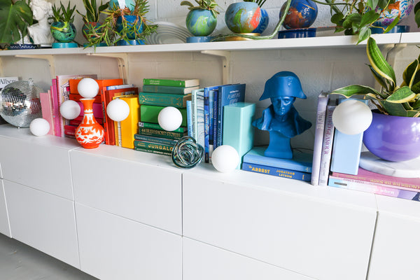 Colorful Bookshelf Lamps with rainbow books and accessories