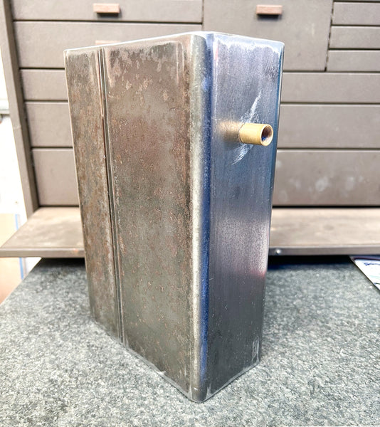 Steel Milton Bookshelf Lamp before it is powdercoated.