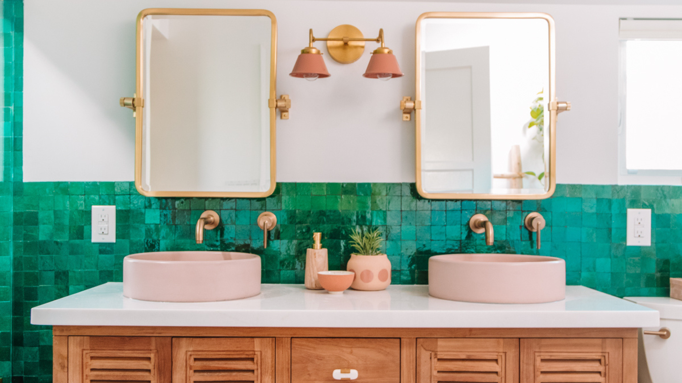 peach and turquoise bathroom featuring Sazerac Stitches light fixture