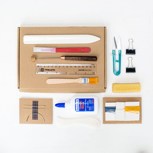 Some bookbinding supplies. You can buy a bookbinding kit on