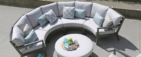 The Lucia Curve Sectional by Ratana Wicker Land Patio