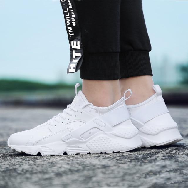 black white sport shoes