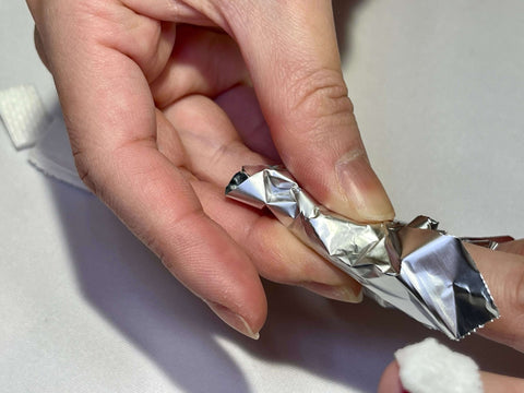 Folding aluminum over the finger