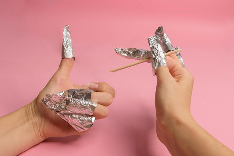 soaking nails in acetone and wrapping with foil
