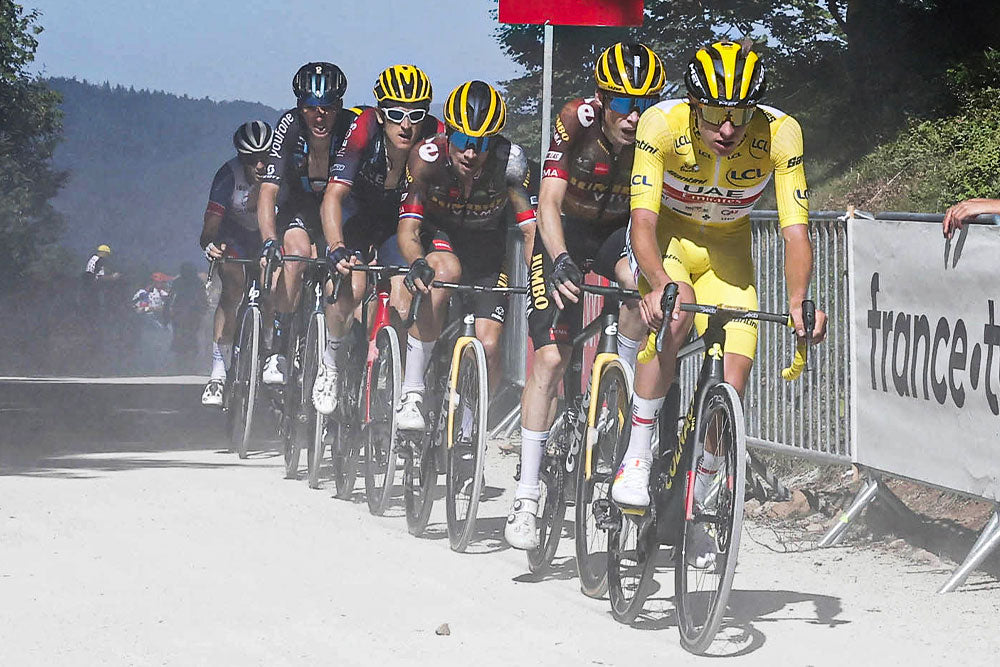 Tour de France 2022 Pogacar leads the peloton of favorites on a dirt track.