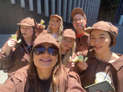 A group of girls dressed up as detectives showing Why Outdoor Team Building Activities Are Better