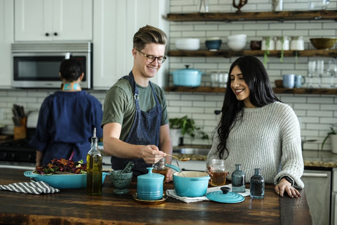 People doing a cooking class as one of the best group activities for adults